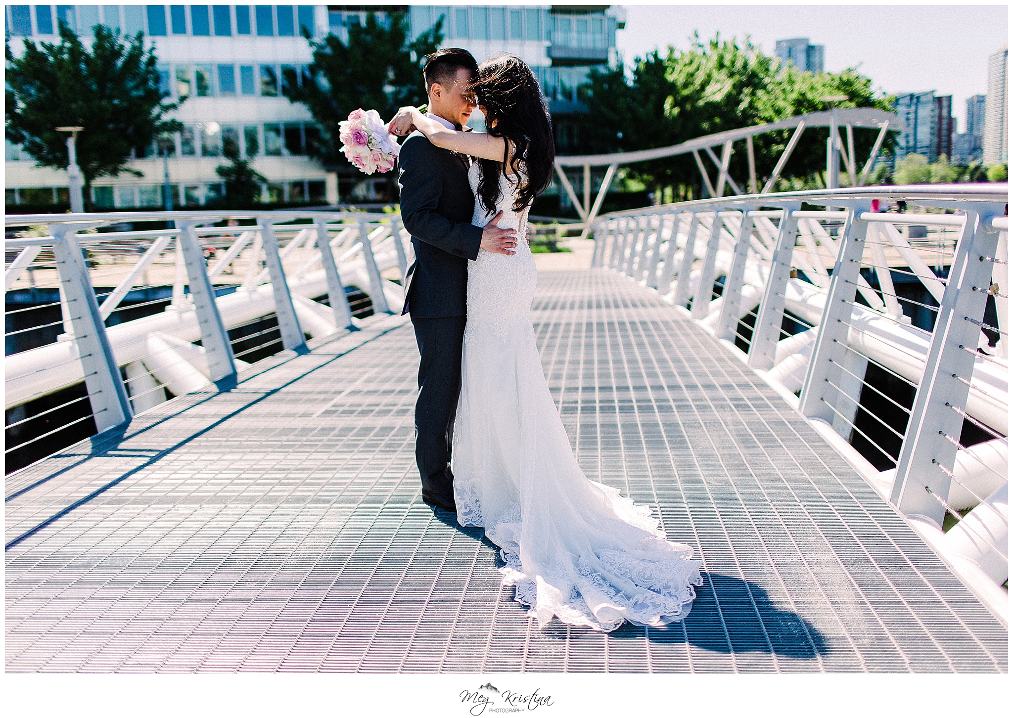 bride and groom portrait on the bridge at Olympic Village, by Meg Kristina Photography